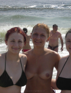 Topless chick on the beach