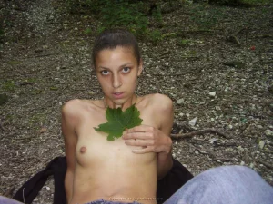 16-chick-in-forest-getting-nude