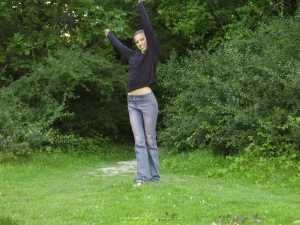 24-chick-in-forest-getting-nude