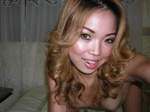 hot-asian-babe-playing-with-her-pussy-03