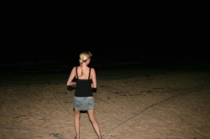 50-topless-chick-on-the-beach-shows-herself