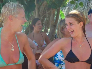 84-topless-chick-on-the-beach-shows-herself